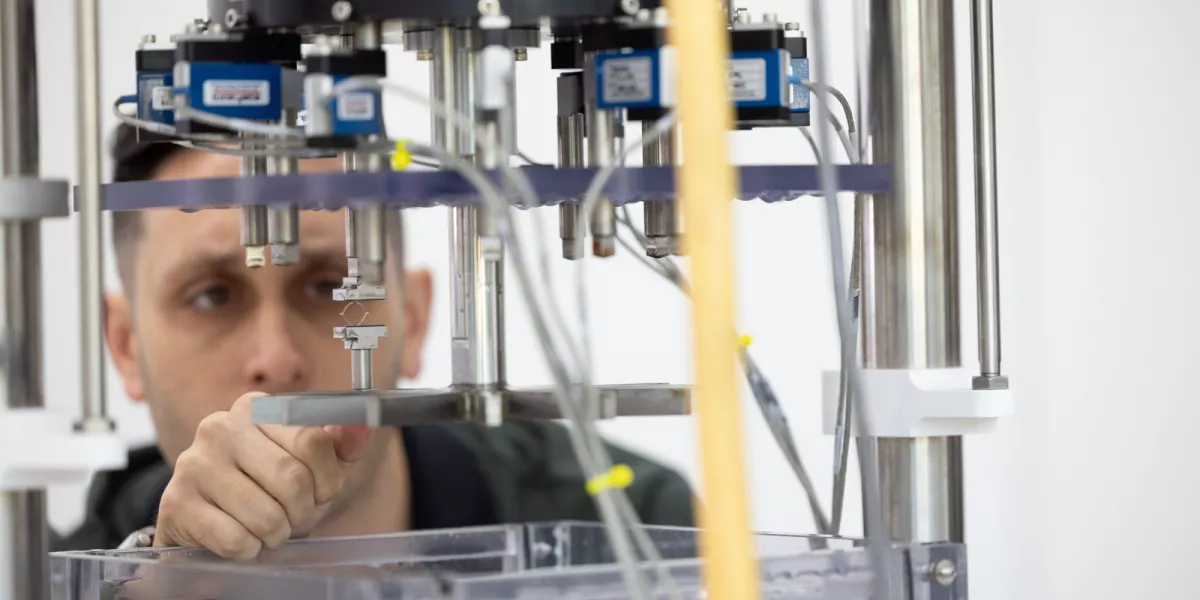 Exponent scientist conducts research in a lab. Our teams advance science and make an impact.