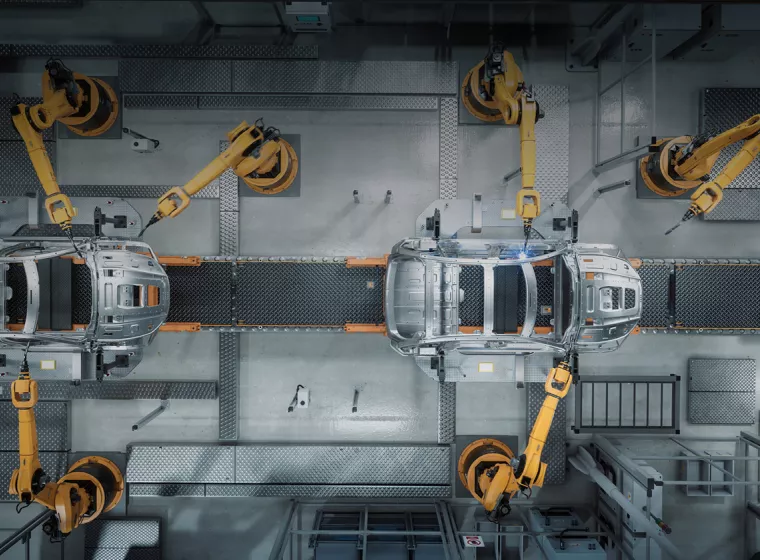 An elevated photo of a car factory. Exponent is a premier engineering and consulting firm with unique solutions to tough challenges.