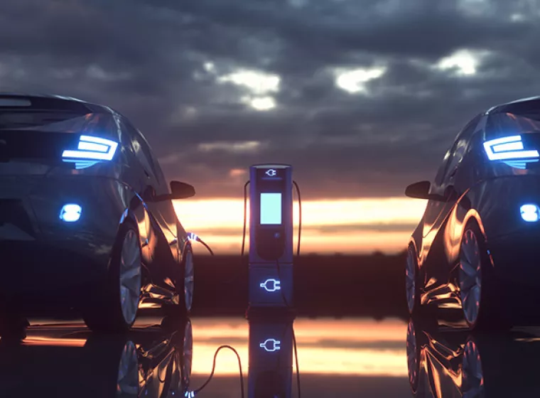 Electric cars plugged into EV charging stations. Exponent engineers and researchers lead the way in