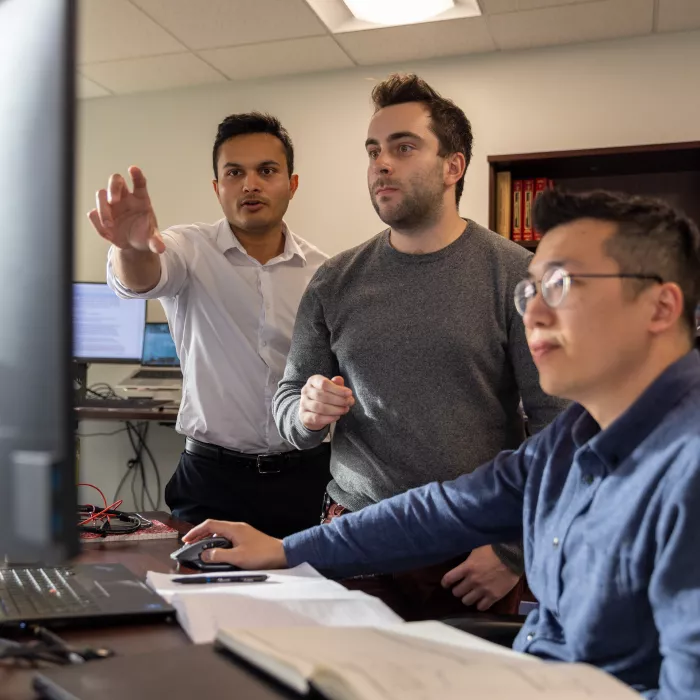 Three Employees in Office