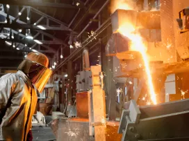 Sparks fly from industrial welding fabrication. Exponent performs fire and flammability testing of all types of products and materials