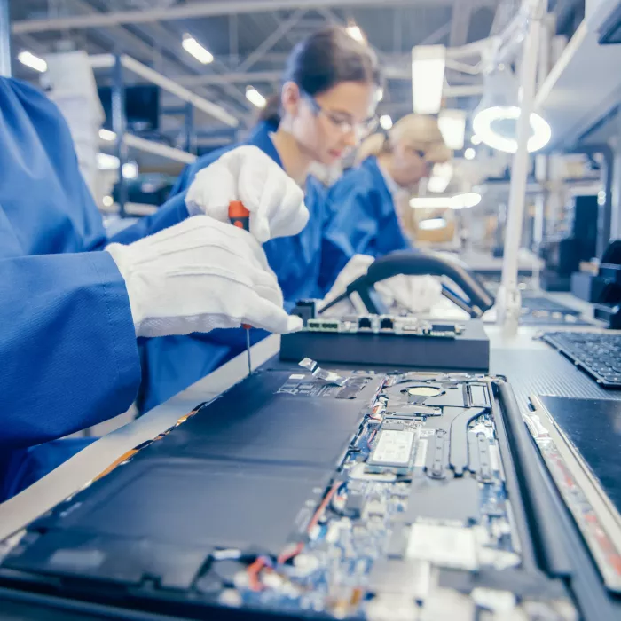 High Tech Factory Facility with Multiple Employees.