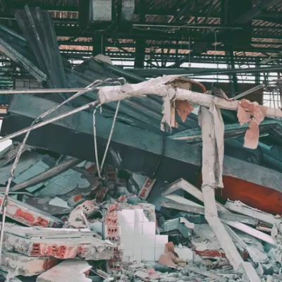 Concrete Bricks and Metal Rubble Inside of Industrial Building