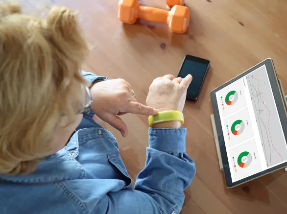 Senior woman using health technology