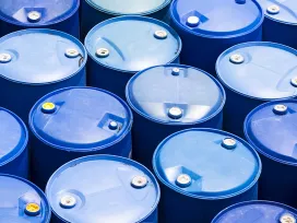Chemicals in blue drum barrels. Exponent test and chemicals to help develop prevent fire hazards.
