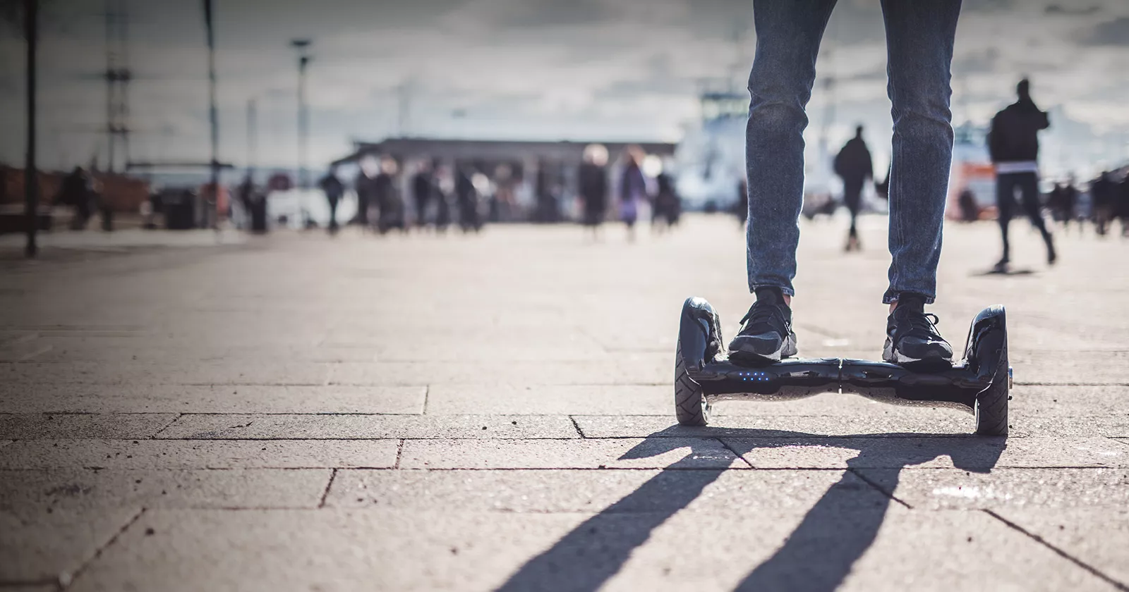 Young person on hoverboard. Exponent engineers and scientists help improve the safety and performance of consumer products.