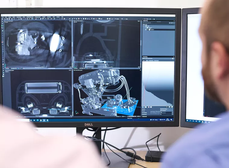 London - 2 working on computer, technical things on screen