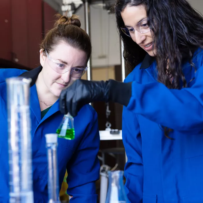 2 Exponent scientists working together in a lab