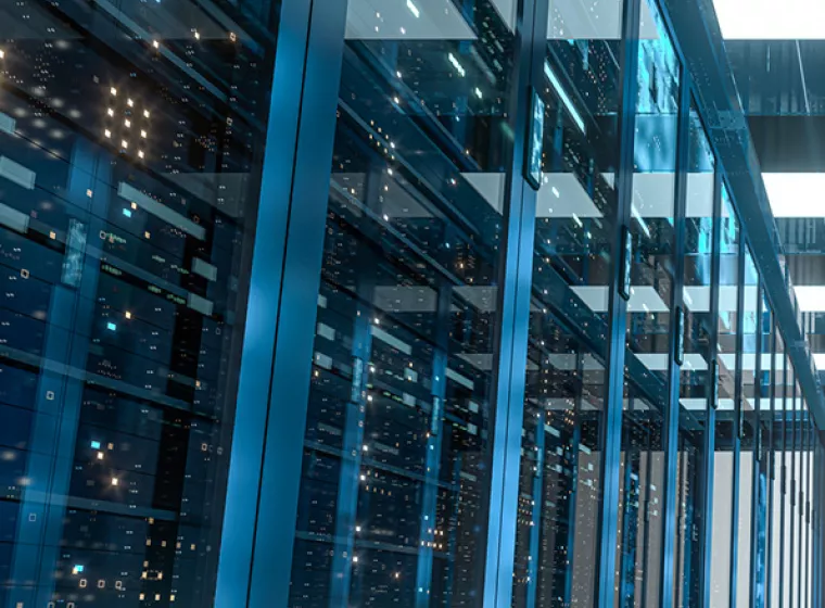  A large wall of computer servers. Exponent helps private and government sectors enhance information security and efficiency.