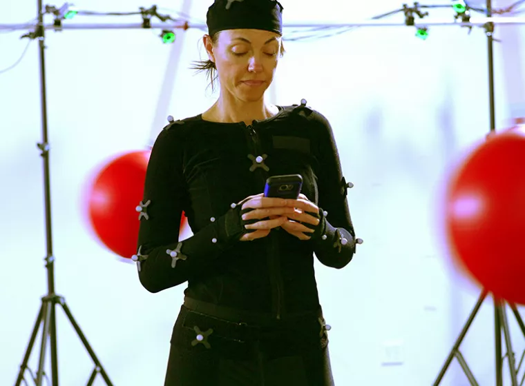 Test subject in Exponent UX research laboratory as research examine the effects of distractions during cell phone use.